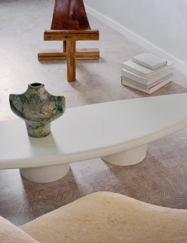 Dominique Zimbacca chair behind Marcel Delmotte vase on Kalou Dubus concrete table 